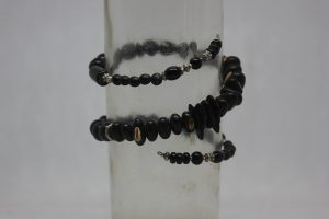 PALMA, OJO NEGRO, CRISTAL NEGRO DE FUNDICIÓN Y LATÓN