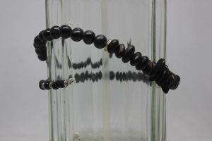 PALMA, OJO NEGRO, CRISTAL NEGRO DE FUNDICIÓN Y LATÓN
