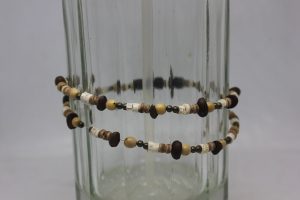 TAGUA PLANA, AÇAÍ, VERTEBRAS, CRISTAL, MADERA Y LATÓN