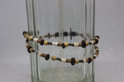 TAGUA PLANA, AÇAÍ, VERTEBRAS, CRISTAL, MADERA Y LATÓN