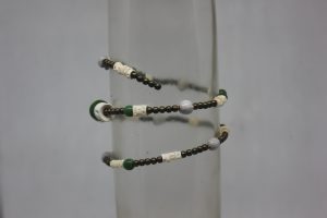 LÁGRIMAS DE SAN PEDRO, VERTEBRAS, CRISTAL VERDE Y LATÓN