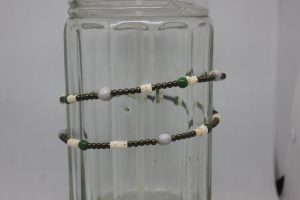 LÁGRIMAS DE SAN PEDRO, VERTEBRAS, CRISTAL VERDE Y LATÓN