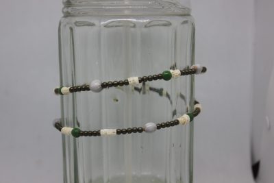 LÁGRIMAS DE SAN PEDRO, VERTEBRAS, CRISTAL VERDE Y LATÓN