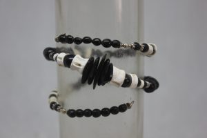 TAGUA PLANA, PALMA, VERTEBRAS Y LATÓN
