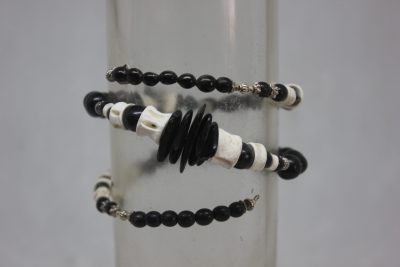TAGUA PLANA, PALMA, VERTEBRAS Y LATÓN