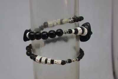 TAGUA PLANA, PALMA, VERTEBRAS Y LATÓN
