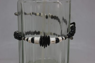 TAGUA PLANA, PALMA, VERTEBRAS Y LATÓN