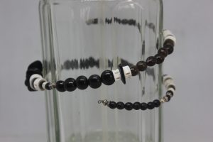 TAGUA PLANA, PALMA, VERTEBRAS Y LATÓN
