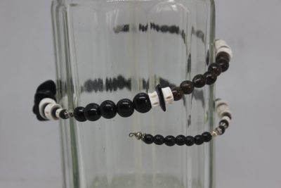 TAGUA PLANA, PALMA, VERTEBRAS Y LATÓN