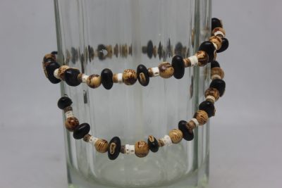 OJO NEGRO, AÇAÍ, VERTEBRAS Y MADERA