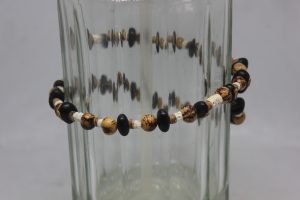 OJO NEGRO, AÇAÍ, VERTEBRAS Y MADERA