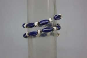 CRISTAL, VERTEBRAS Y LATÓN