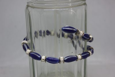 CRISTAL, VERTEBRAS Y LATÓN